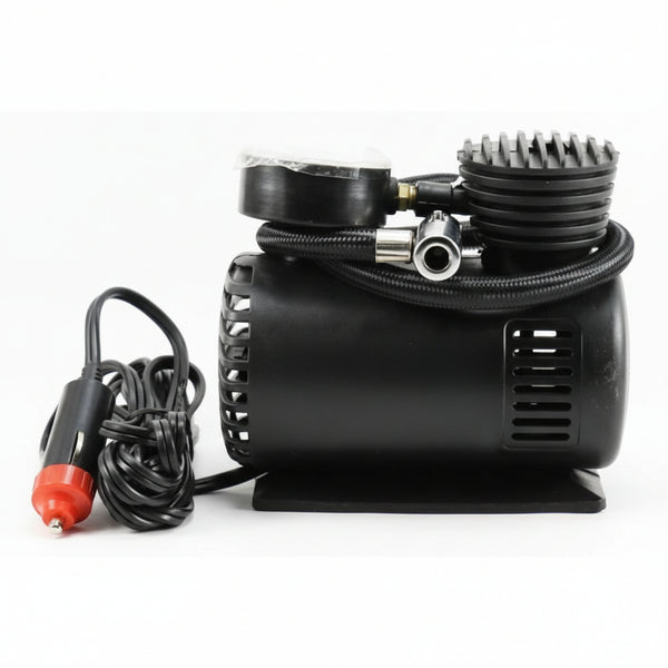 Car air compressor with gauge and cable on a white background